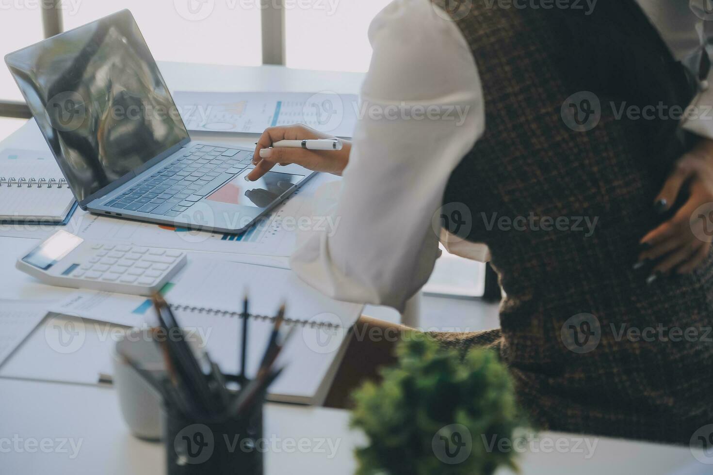 Business team collaboration discussing working analyzing with financial data and marketing growth report graph in team, presentation and brainstorming to strategy planning making profit of company. photo
