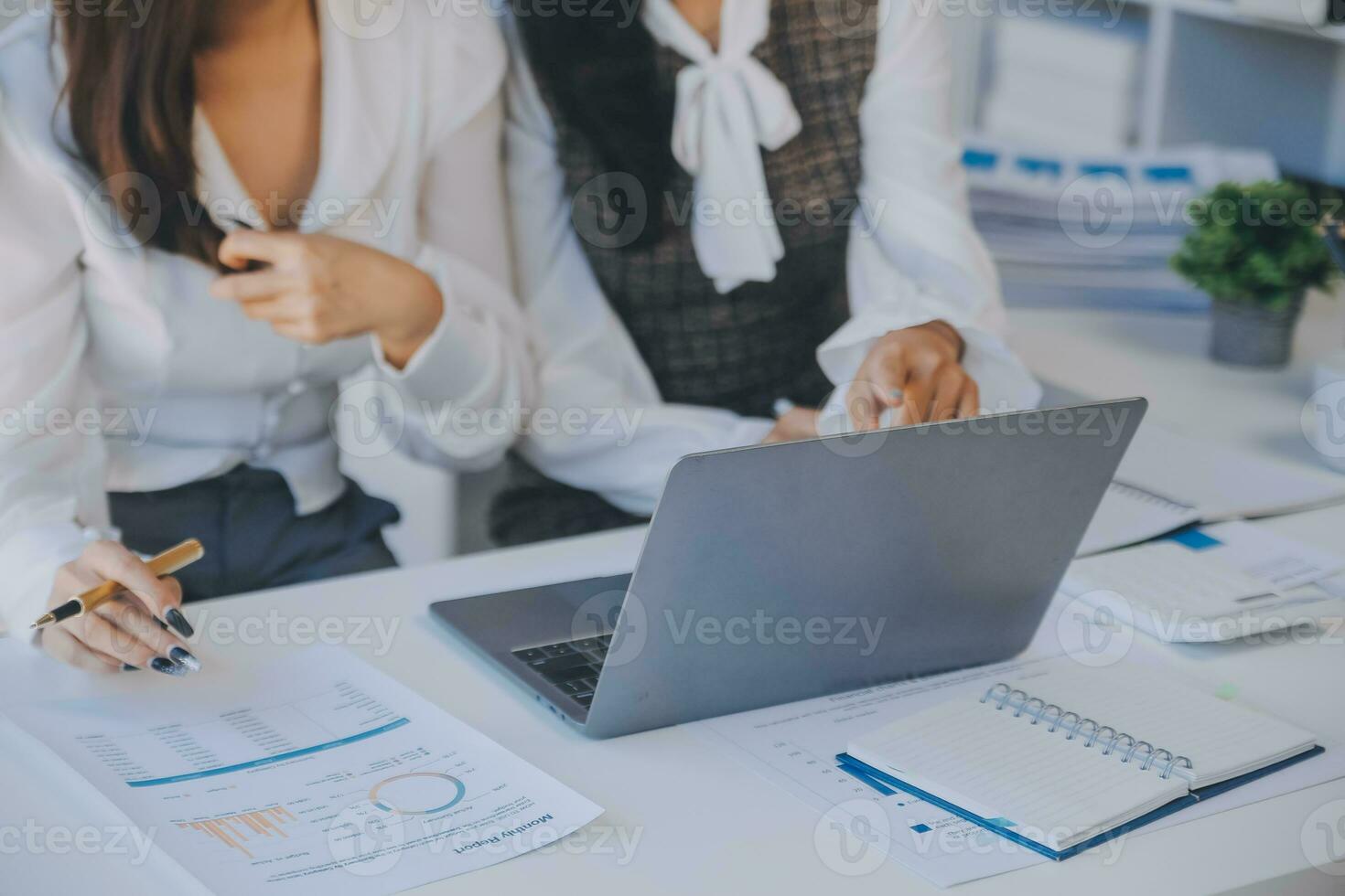 Business team collaboration discussing working analyzing with financial data and marketing growth report graph in team, presentation and brainstorming to strategy planning making profit of company. photo