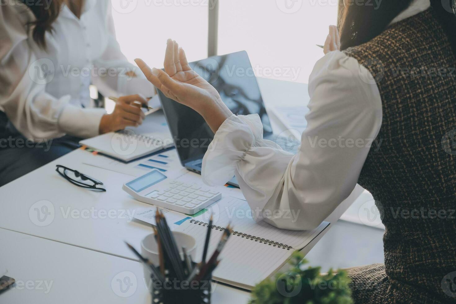 Business team collaboration discussing working analyzing with financial data and marketing growth report graph in team, presentation and brainstorming to strategy planning making profit of company. photo