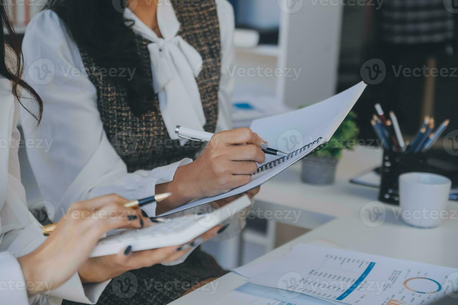 Business team collaboration discussing working analyzing with financial data and marketing growth report graph in team, presentation and brainstorming to strategy planning making profit of company. photo