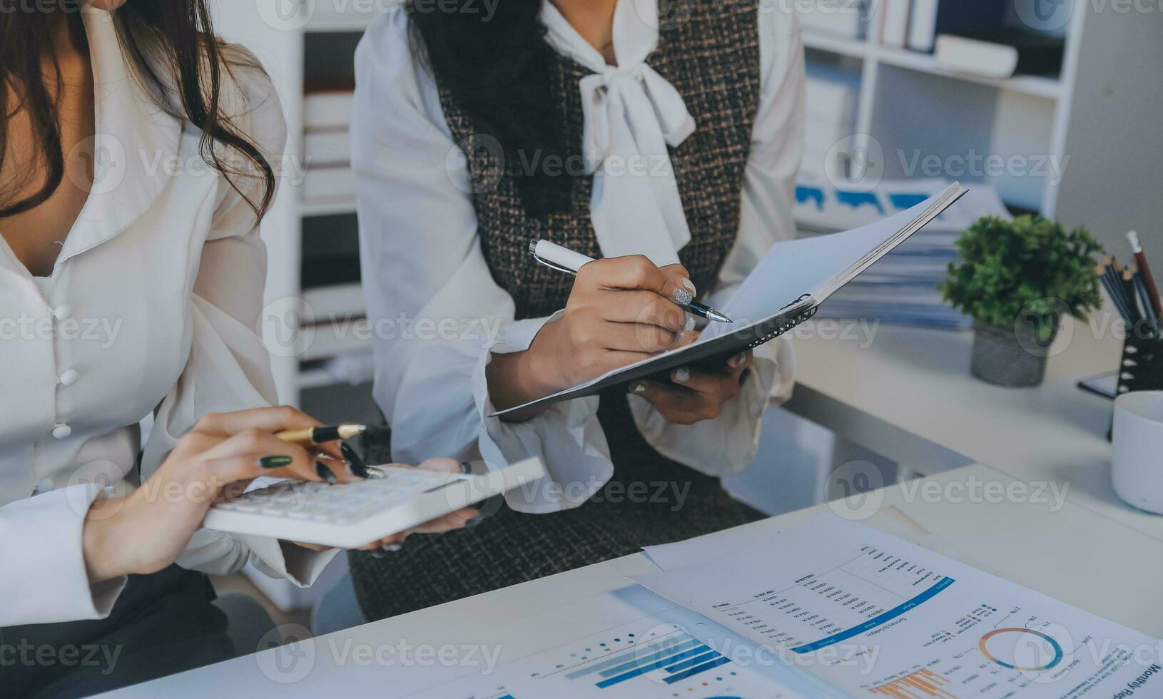 Business team collaboration discussing working analyzing with financial data and marketing growth report graph in team, presentation and brainstorming to strategy planning making profit of company. photo