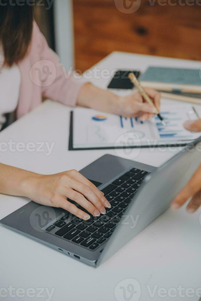 Finance manager meeting discussing company growth project success financial statistics, professional investor working start up project for strategy plan with document, laptop and digital tablet. photo