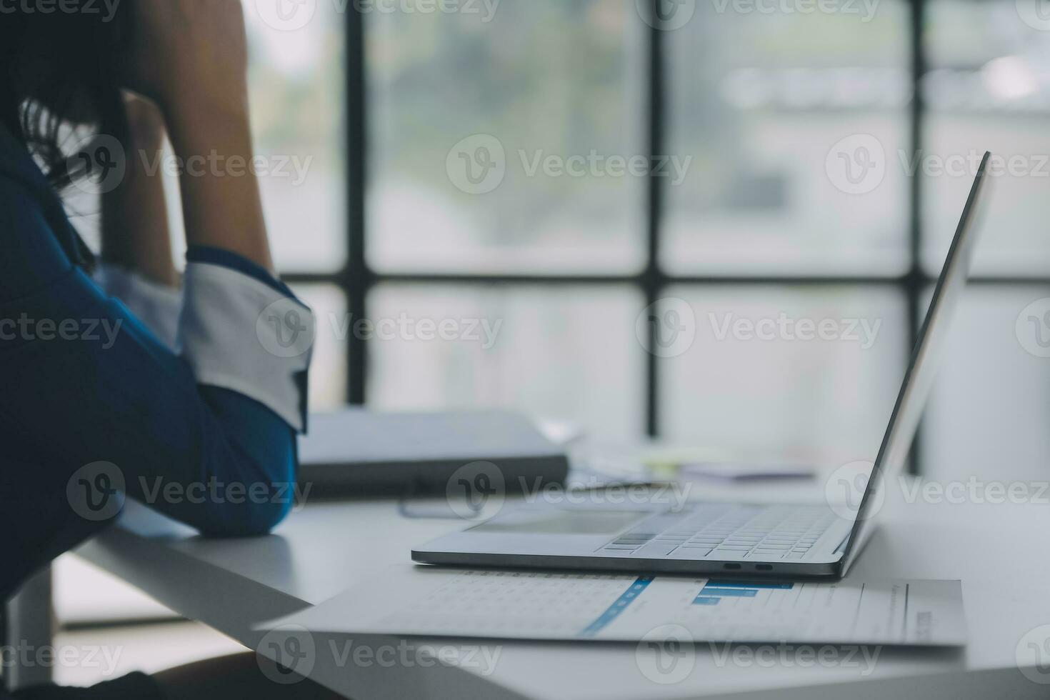 Audit concept,Administrator business man financial inspector and secretary making report calculating balance. Internal Revenue Service checking document. photo
