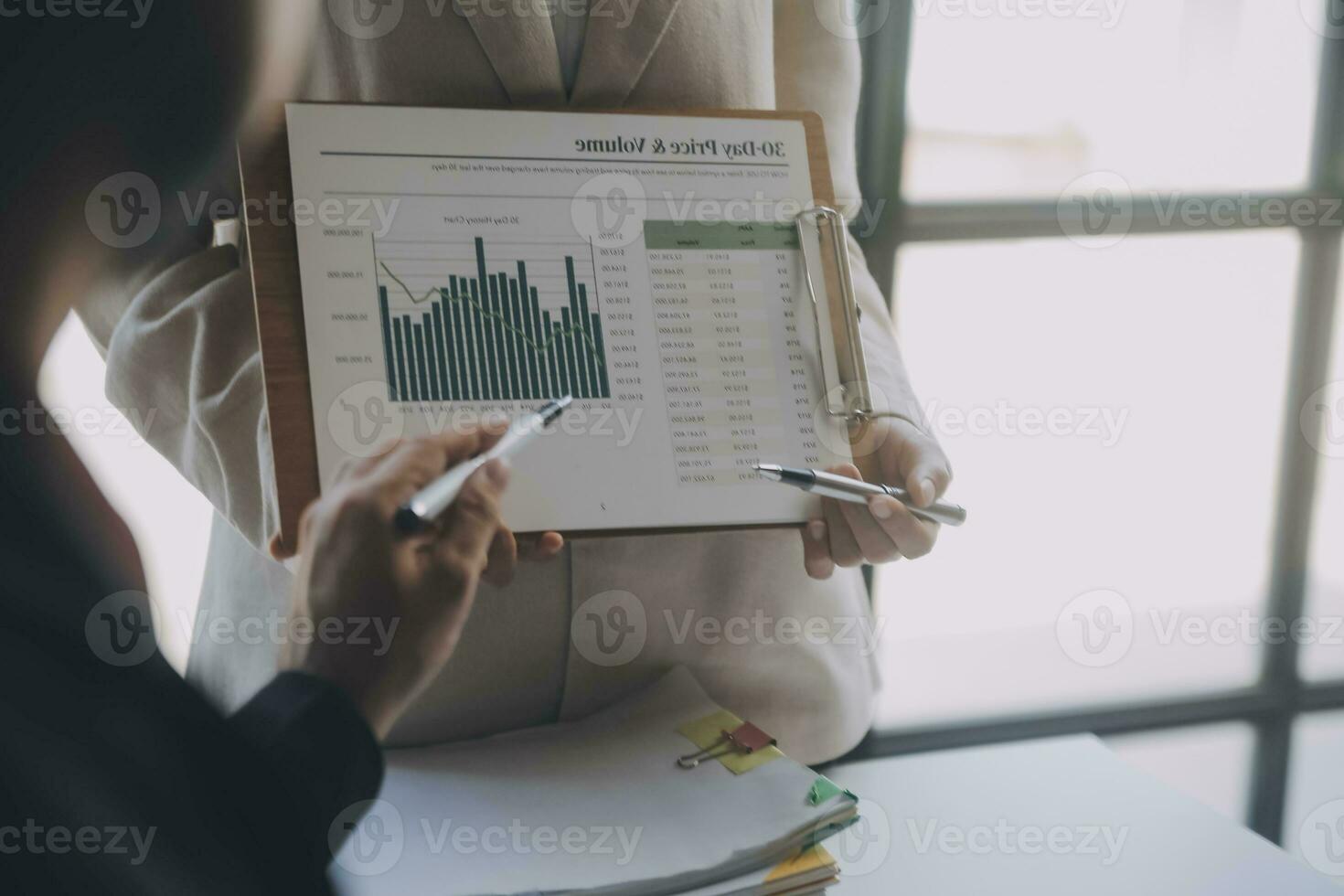 Audit concept,Administrator business man financial inspector and secretary making report calculating balance. Internal Revenue Service checking document. photo