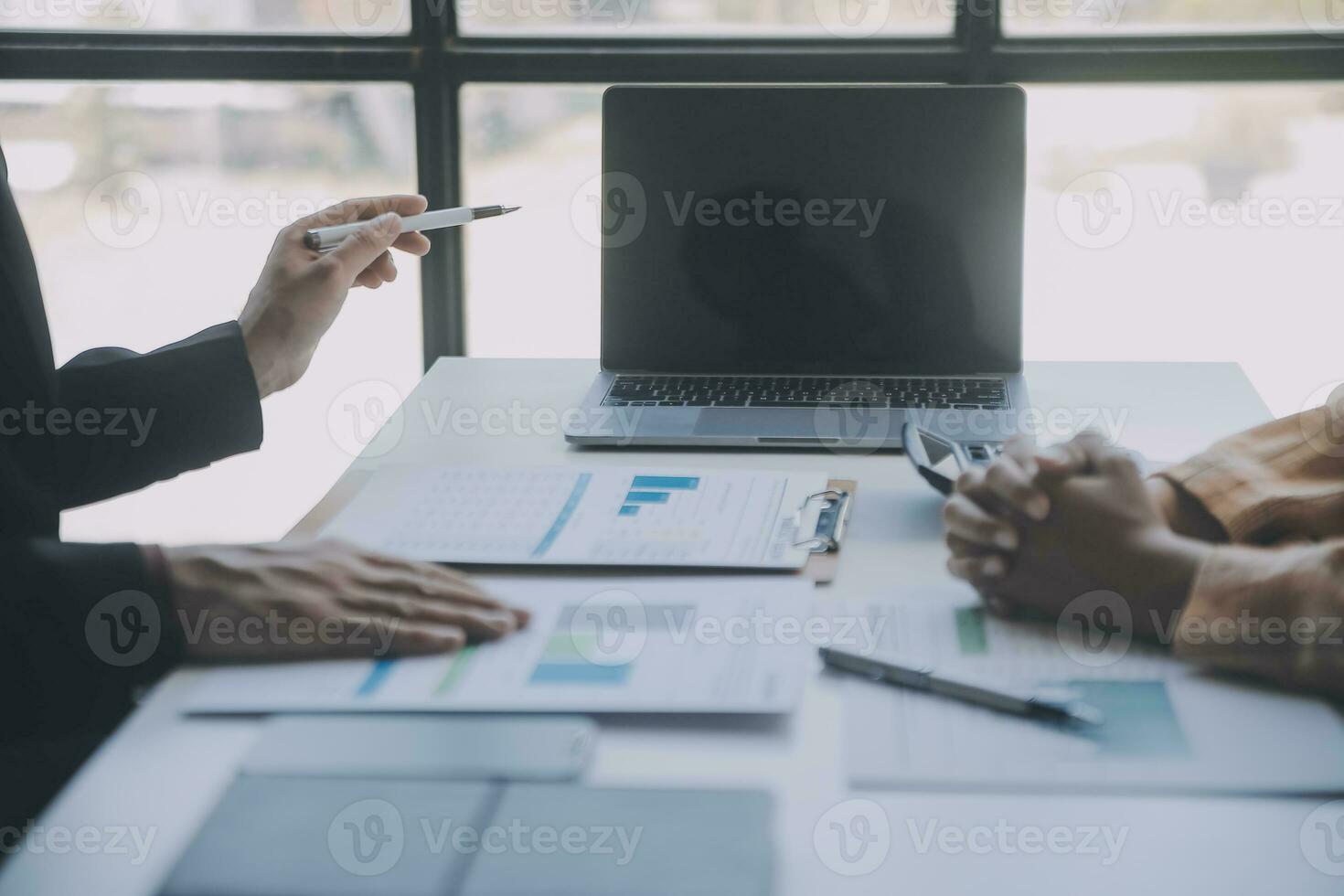 Audit concept,Administrator business man financial inspector and secretary making report calculating balance. Internal Revenue Service checking document. photo