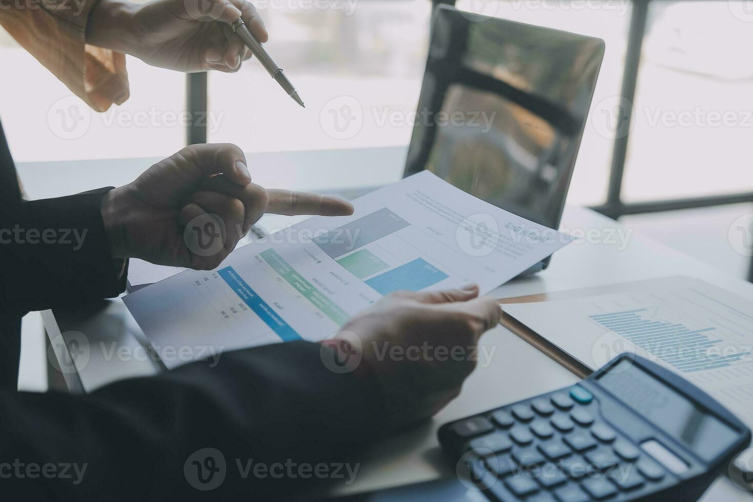 Audit concept,Administrator business man financial inspector and secretary making report calculating balance. Internal Revenue Service checking document. photo