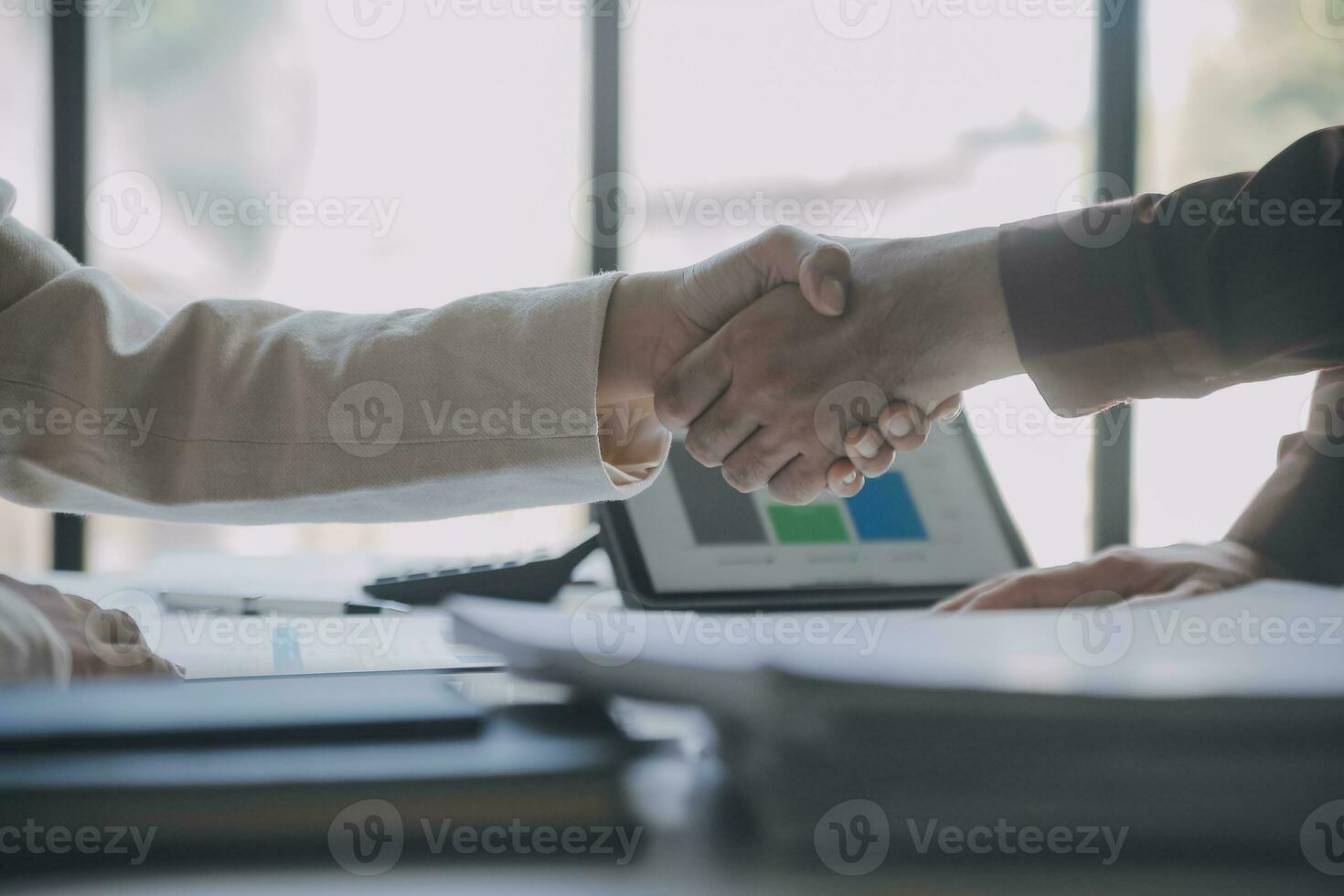 Audit concept,Administrator business man financial inspector and secretary making report calculating balance. Internal Revenue Service checking document. photo