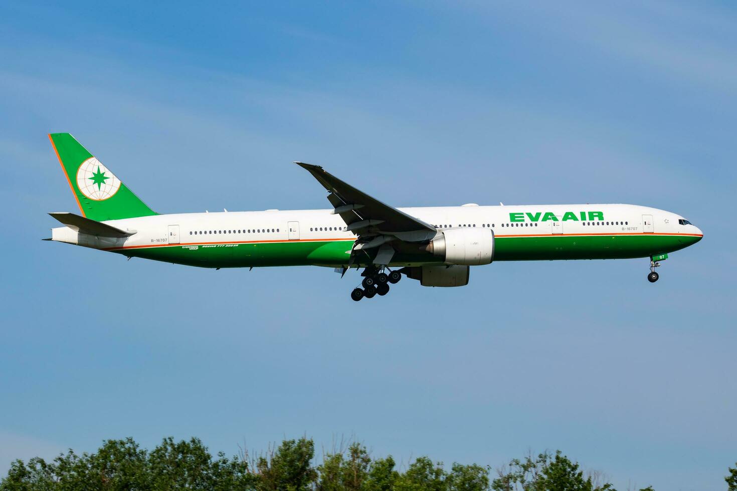 Vienna, Austria, 2018 - EVA Air Boeing 777-300ER B-16707 passenger plane arrival and landing at Vienna Airport photo