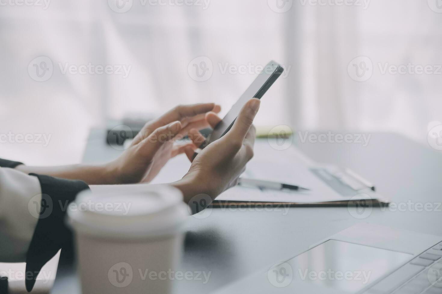 Financial analysts analyze business financial reports on a digital tablet planning investment project during a discussion at a meeting of corporate showing the results of their successful teamwork. photo