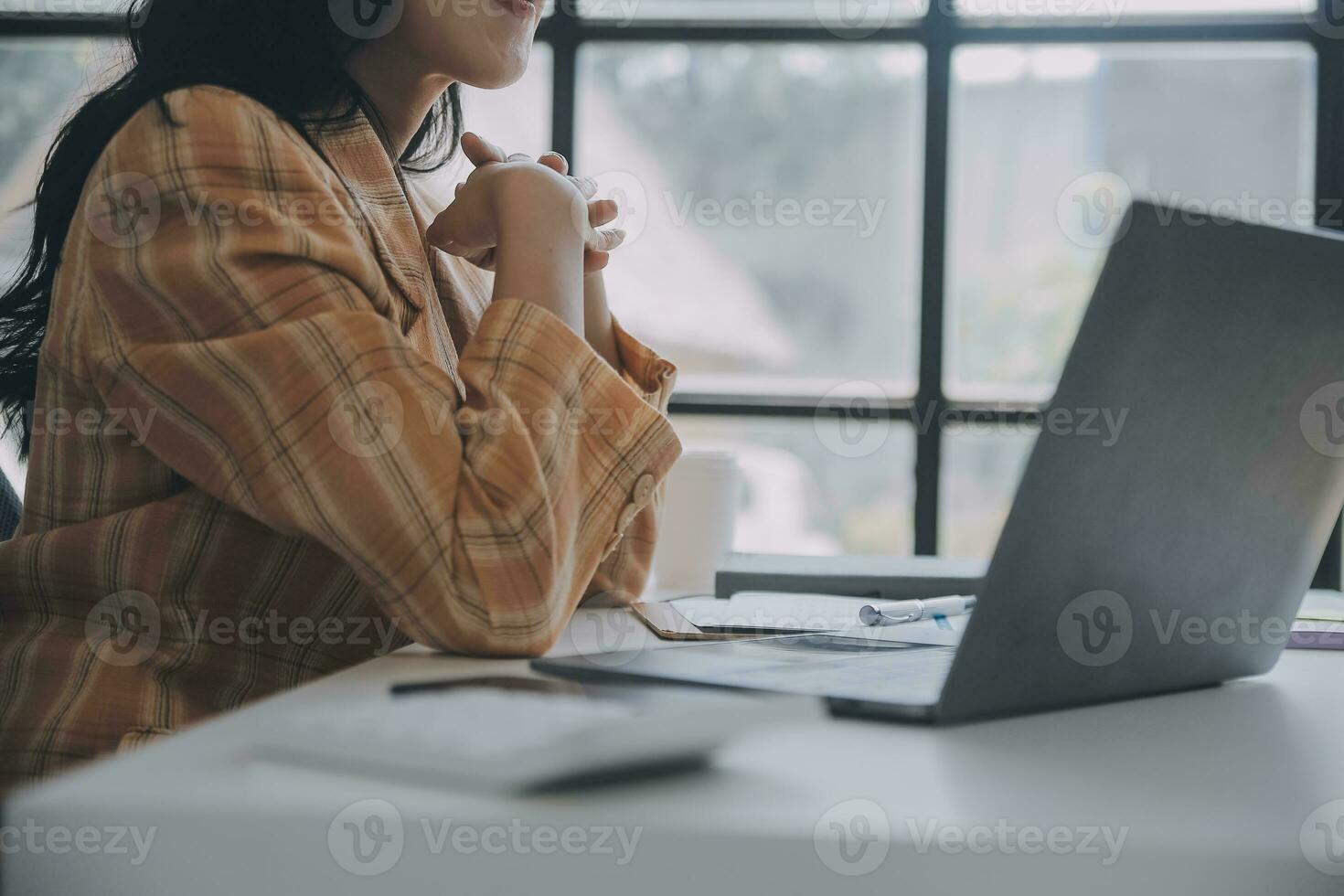 Financial analysts analyze business financial reports on a digital tablet planning investment project during a discussion at a meeting of corporate showing the results of their successful teamwork. photo