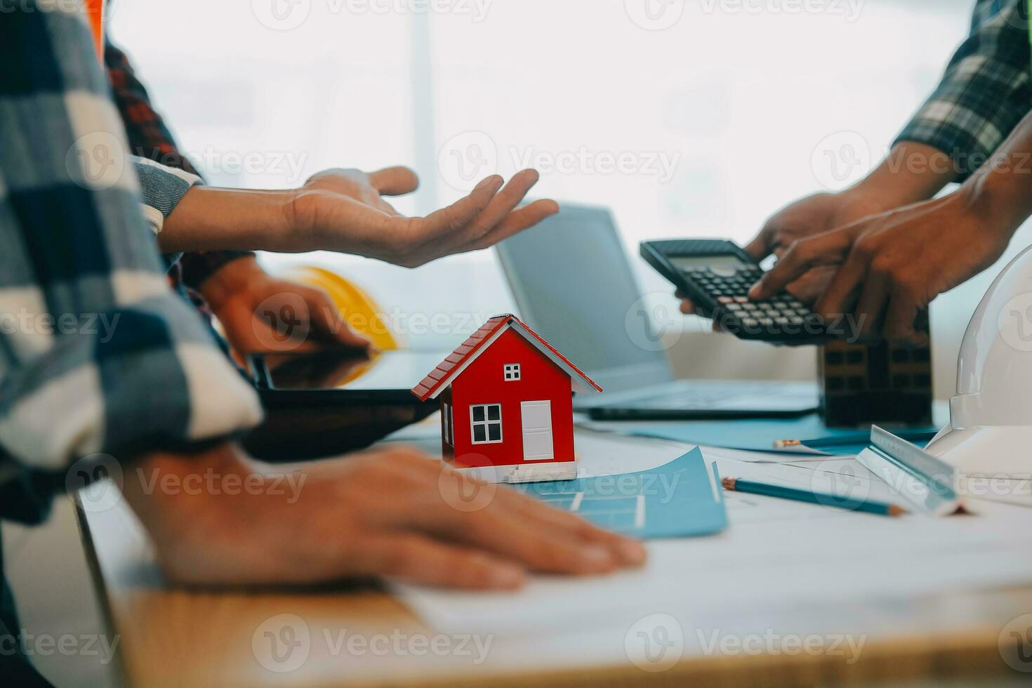 Construction and structure concept of Engineer or architect meeting for project working with partner and engineering tools on model building and blueprint in working site, contract for both companies. photo