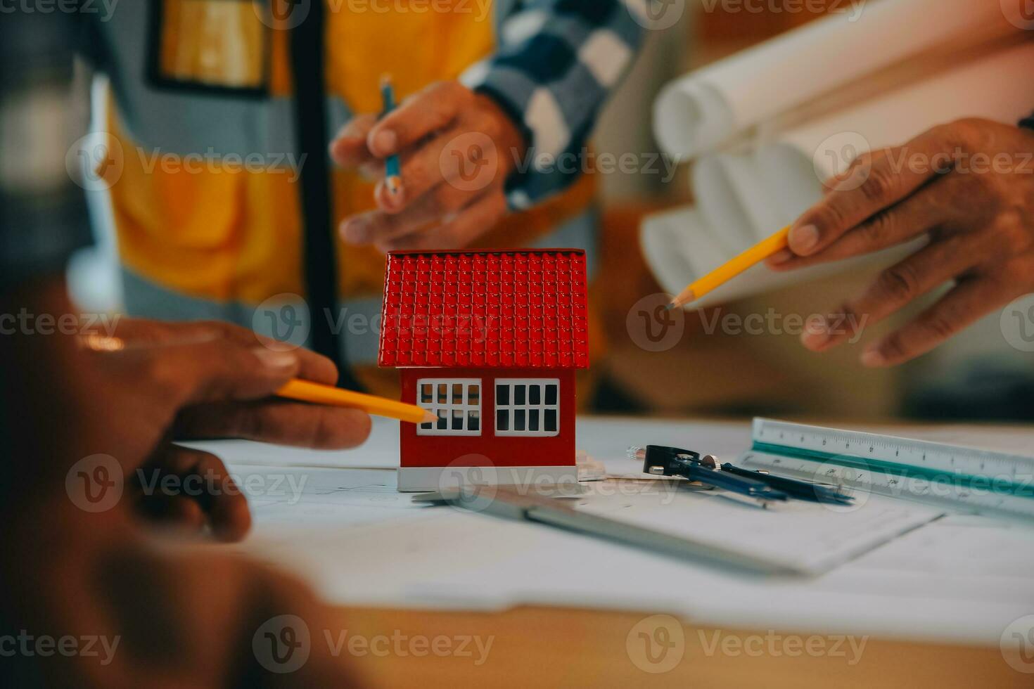 Construction and structure concept of Engineer or architect meeting for project working with partner and engineering tools on model building and blueprint in working site, contract for both companies. photo