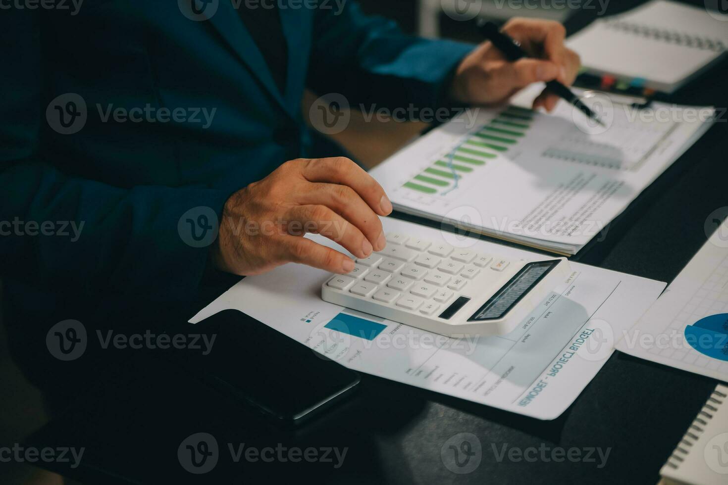 Financial Business team present. Business man hands hold documents with financial statistic stock photo, discussion, and analysis report data the charts and graphs. Finance Financial concept photo