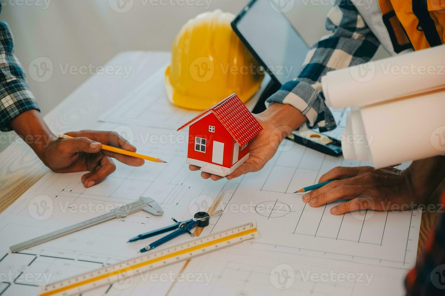 Construction and structure concept of Engineer or architect meeting for project working with partner and engineering tools on model building and blueprint in working site, contract for both companies. photo
