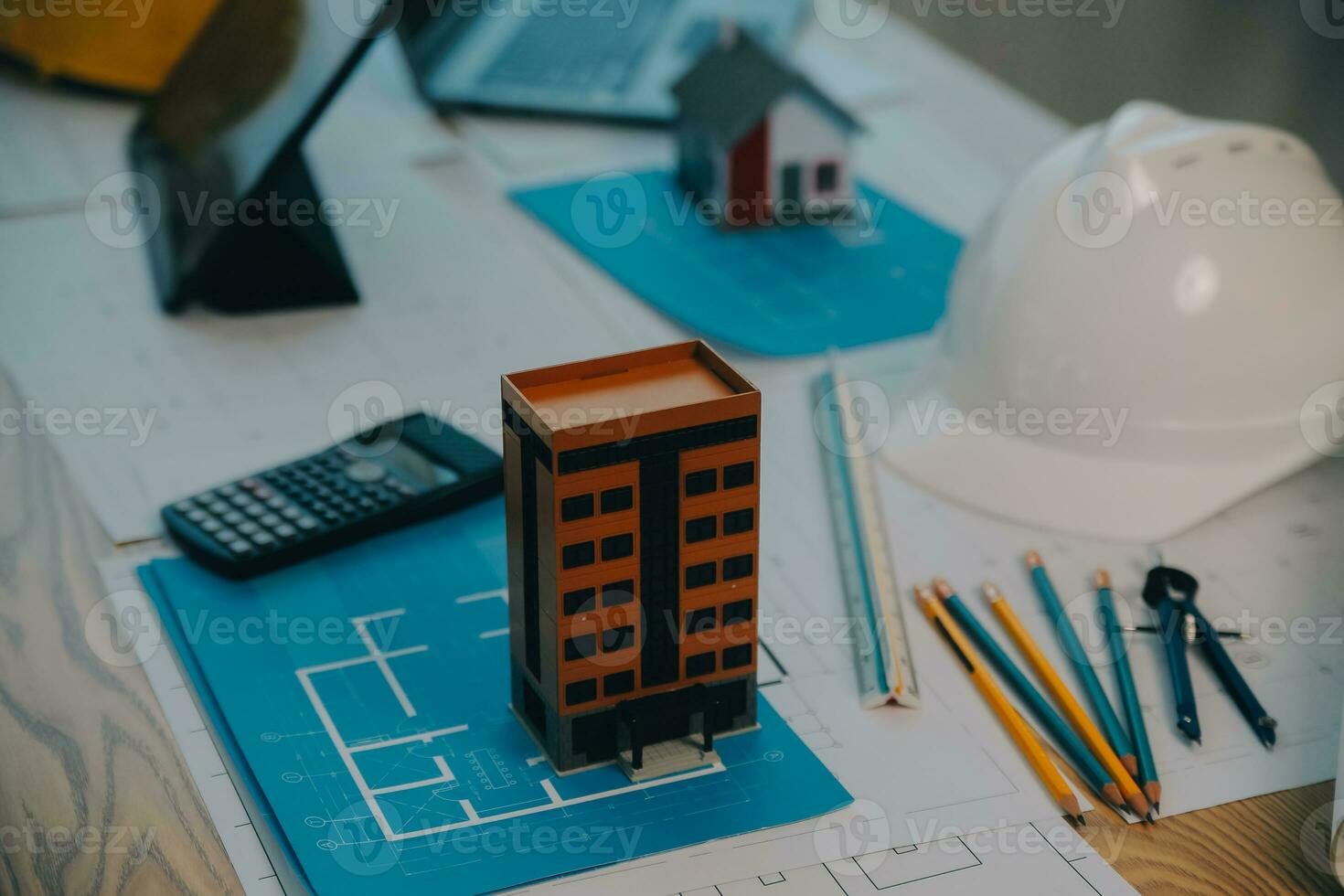 Construction and structure concept of Engineer or architect meeting for project working with partner and engineering tools on model building and blueprint in working site, contract for both companies. photo