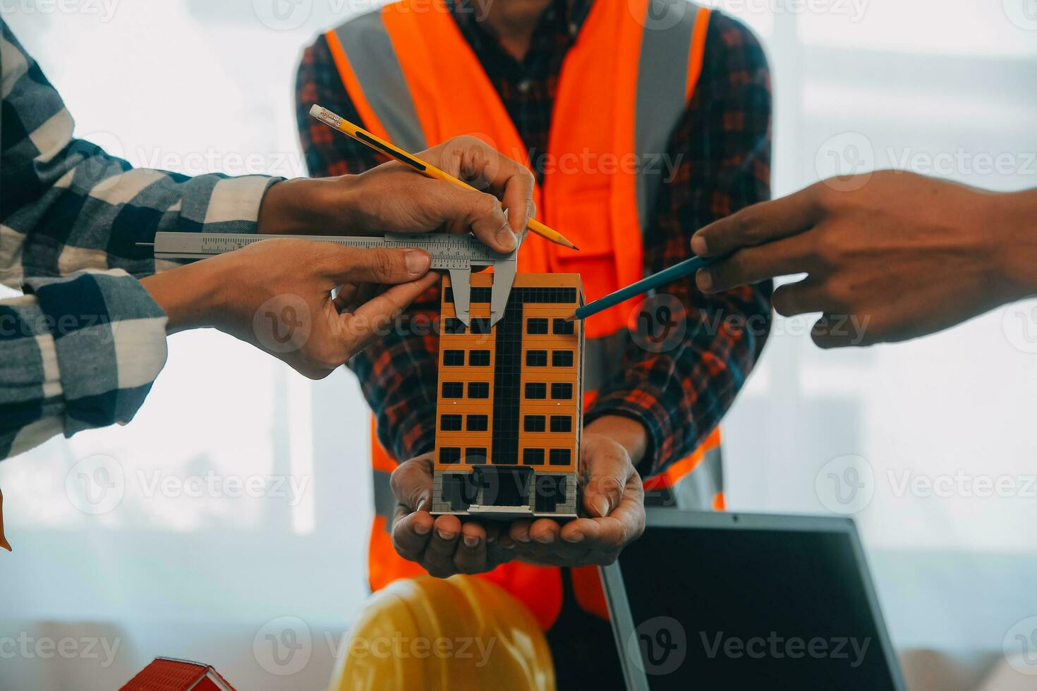Construction and structure concept of Engineer or architect meeting for project working with partner and engineering tools on model building and blueprint in working site, contract for both companies. photo