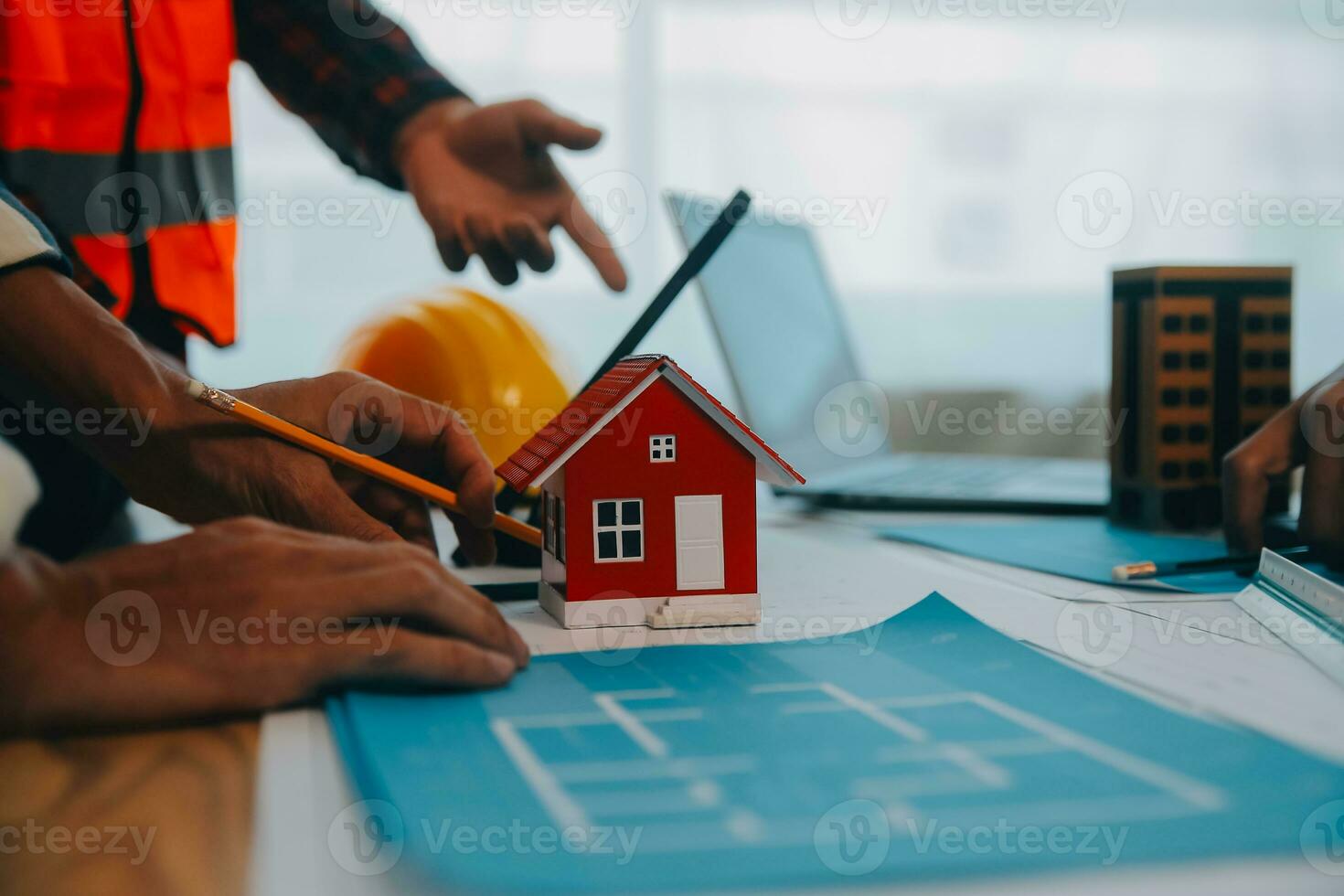 Construction and structure concept of Engineer or architect meeting for project working with partner and engineering tools on model building and blueprint in working site, contract for both companies. photo