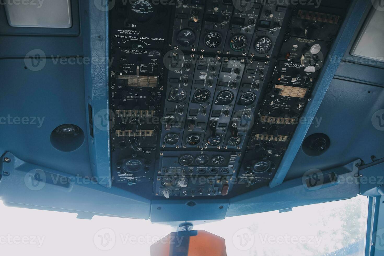 inside a big jet flying plane cockpit,flying above clouds photo