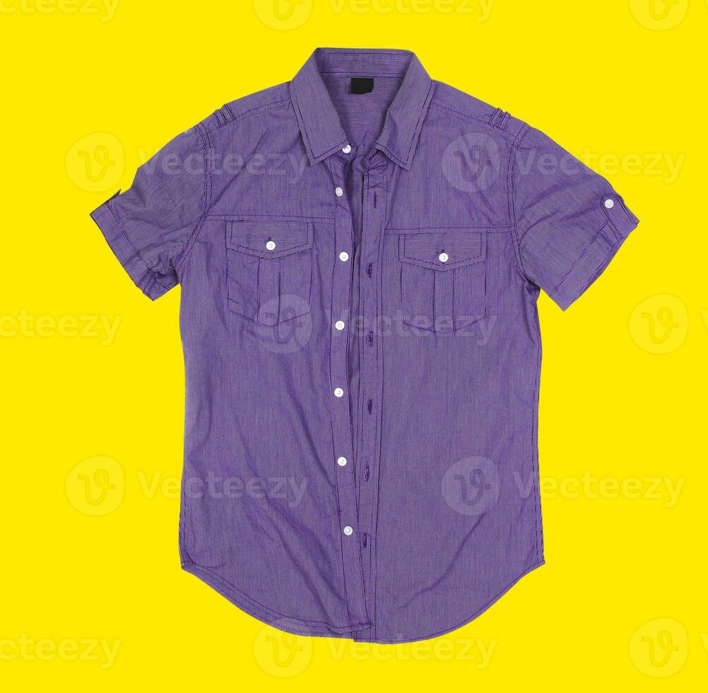 Button shirt on yellow background photo