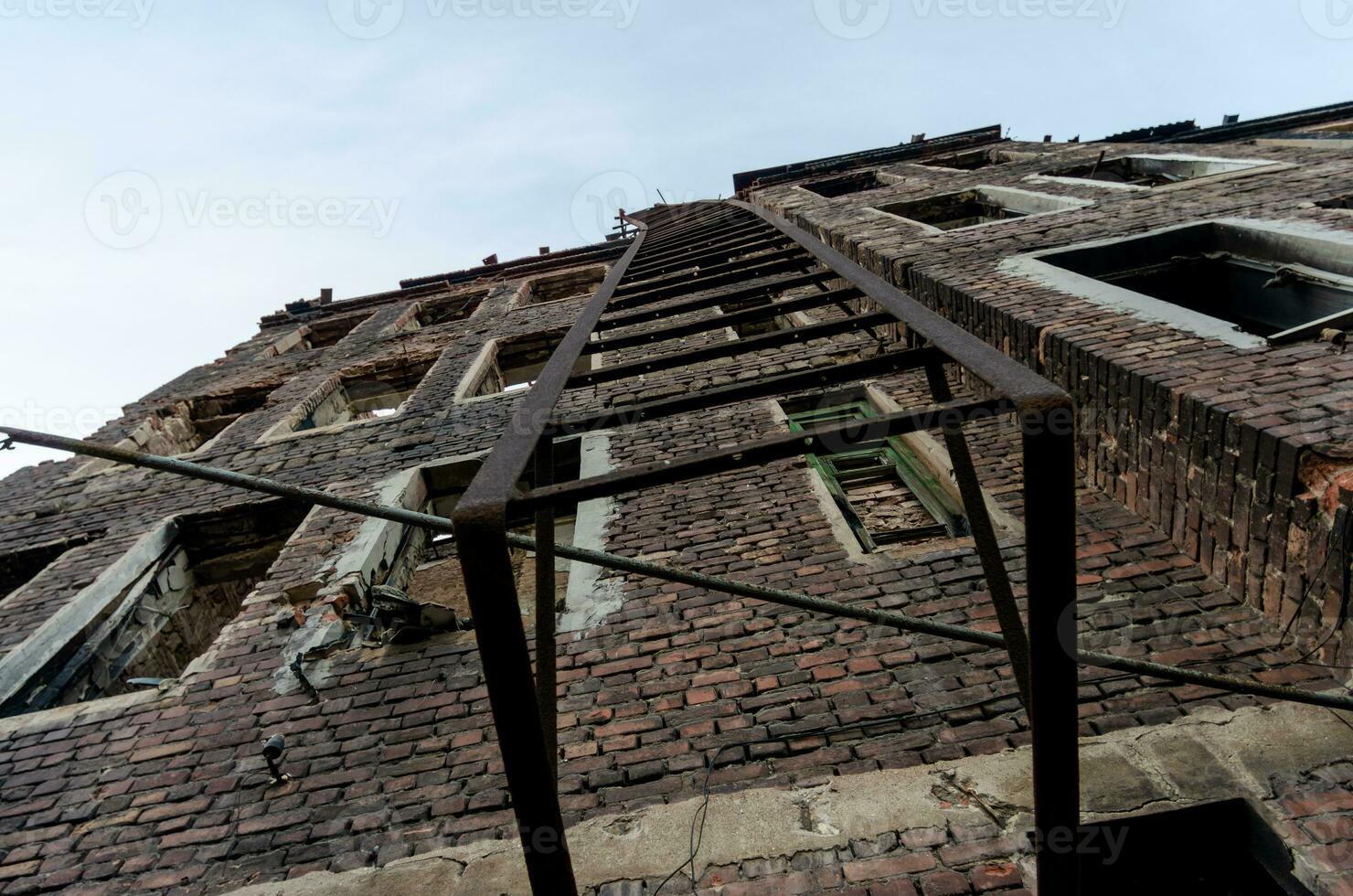destroyed and burned houses in the city Russia Ukraine war photo