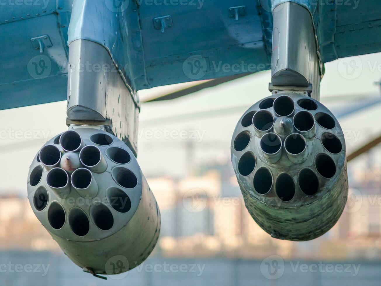 army military rocket launcher on the wing of an airplane photo