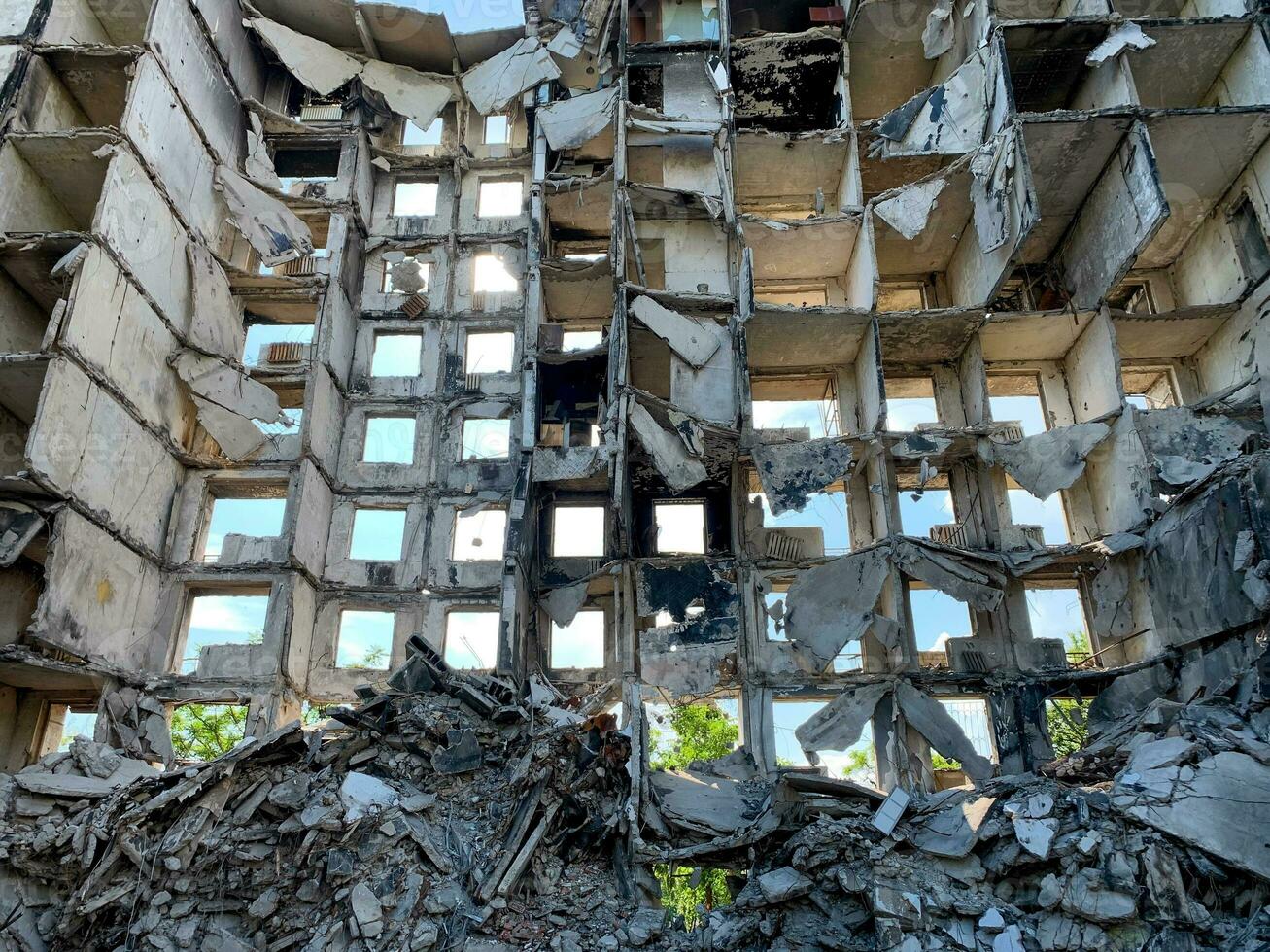 destroyed and burned houses in the city Russia Ukraine war photo