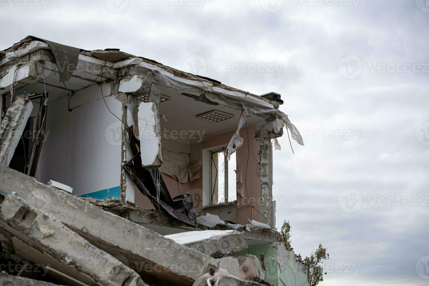 destroyed and burned houses in the city during the war in Ukraine photo