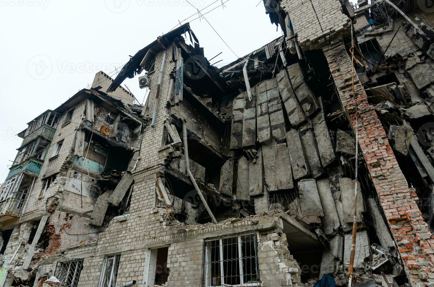 destroyed and burned houses in the city Russia Ukraine war photo