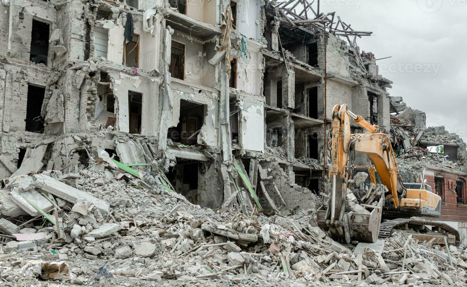 destroyed and burned houses in the city in Ukraine war photo