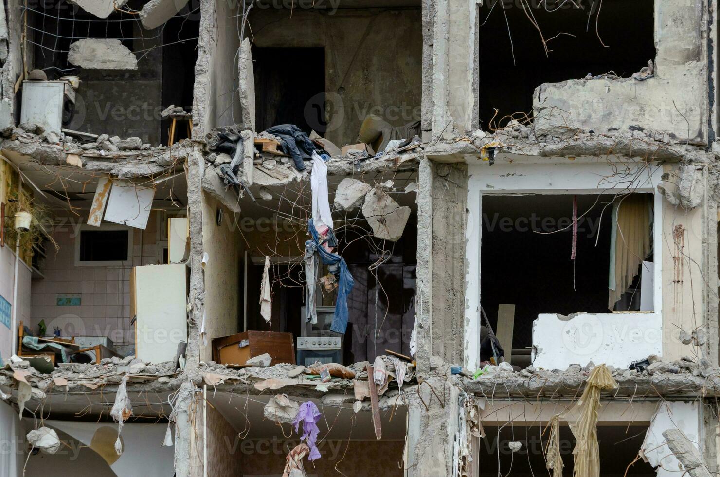 destroyed and burned houses in the city during the war in Ukraine photo