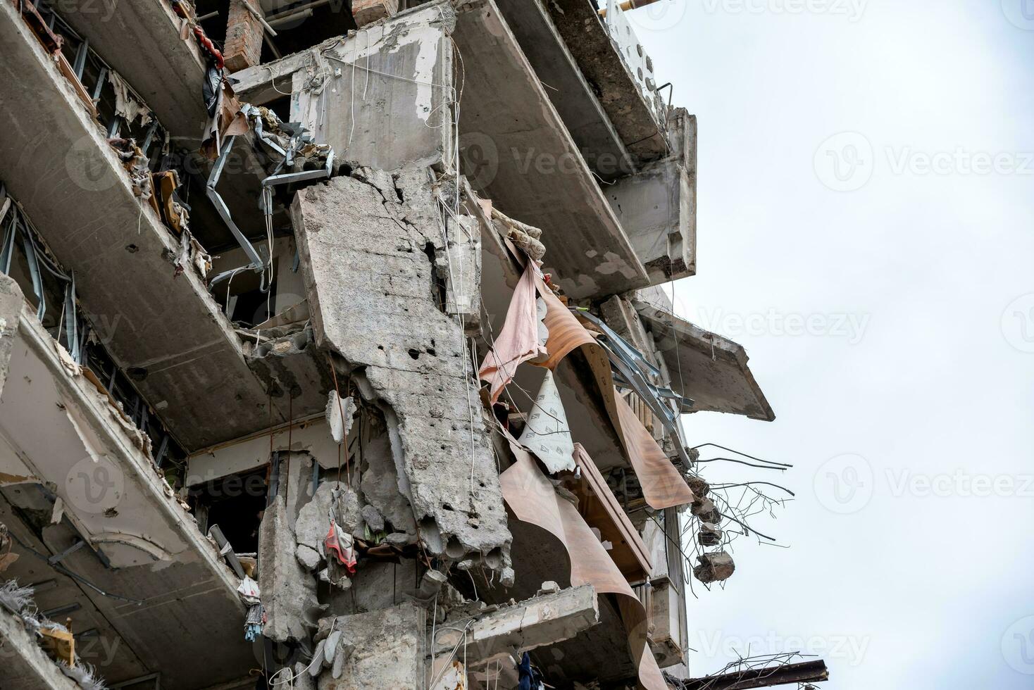 destroyed and burned houses in the city during the war in Ukraine photo