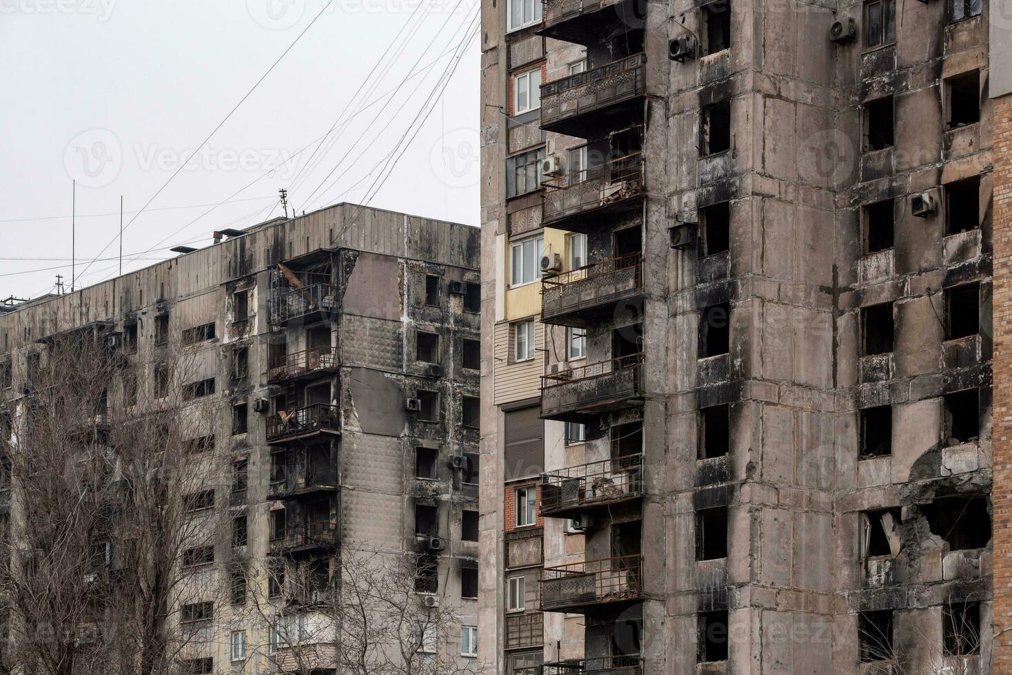 destroyed and burned houses in the city Russia Ukraine war photo