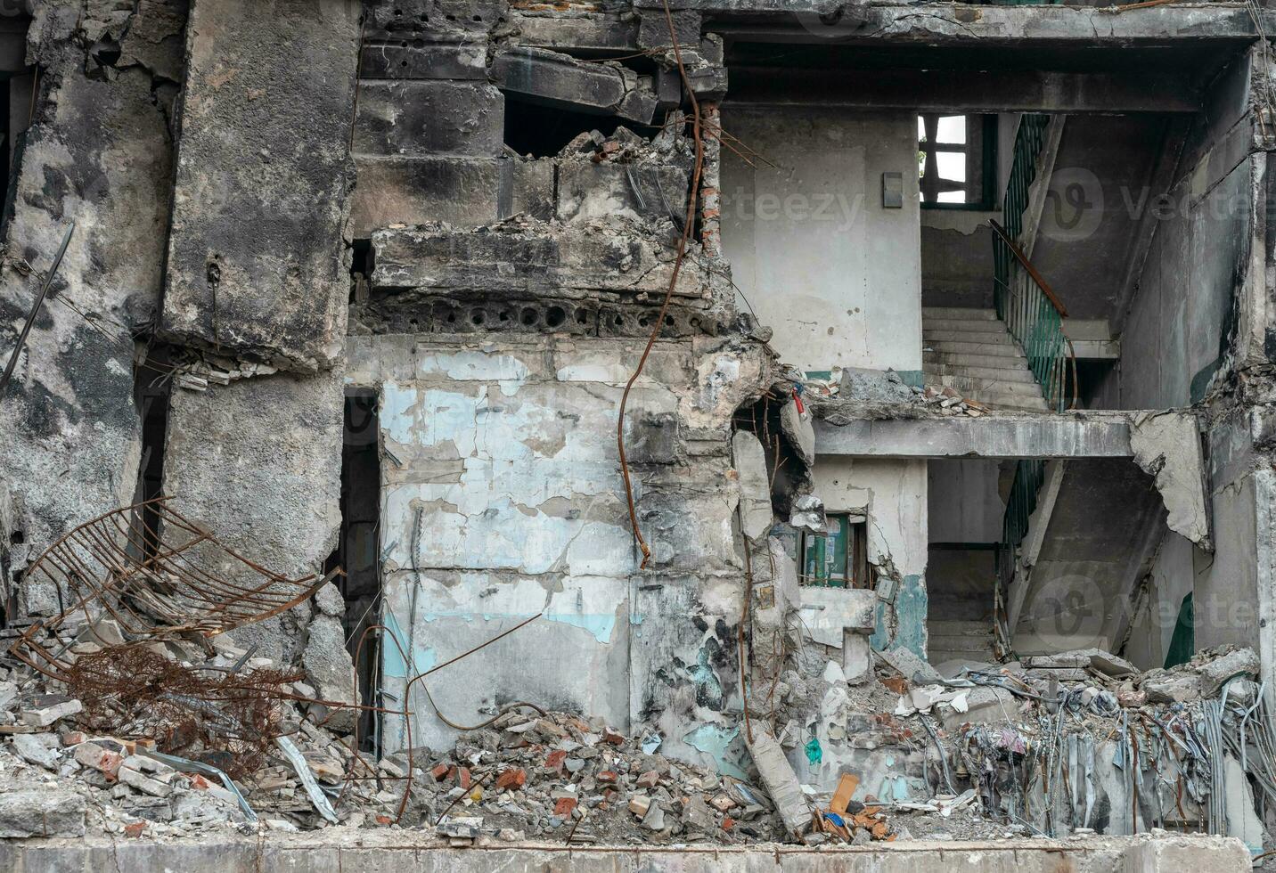 destroyed and burned houses in the city during the war in Ukraine photo