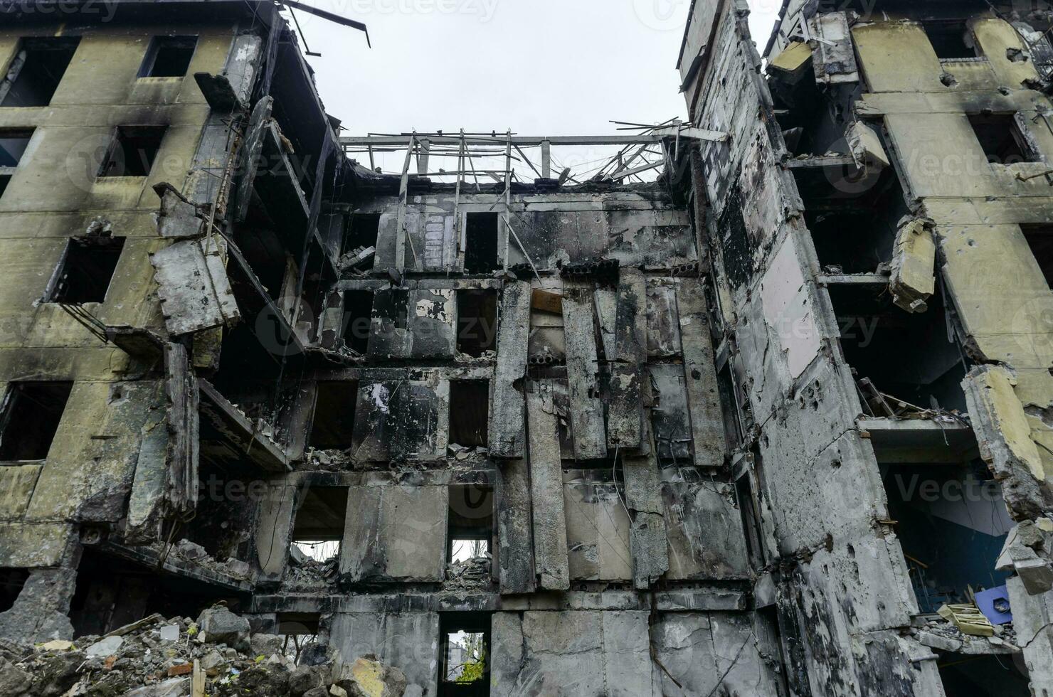 destroyed and burned houses in the city Russia Ukraine war photo