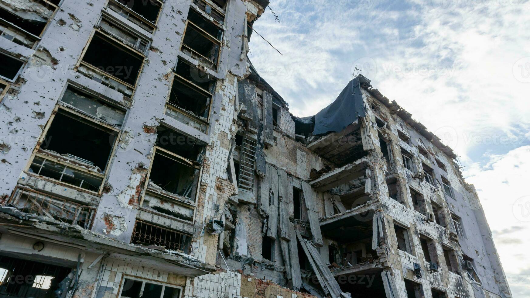 destroyed and burned houses in the city Russia Ukraine war photo