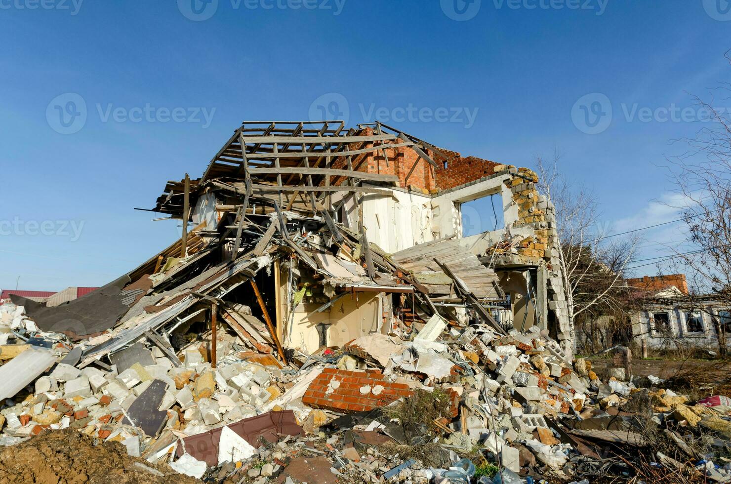 destroyed and burned houses in the city Russia Ukraine war photo