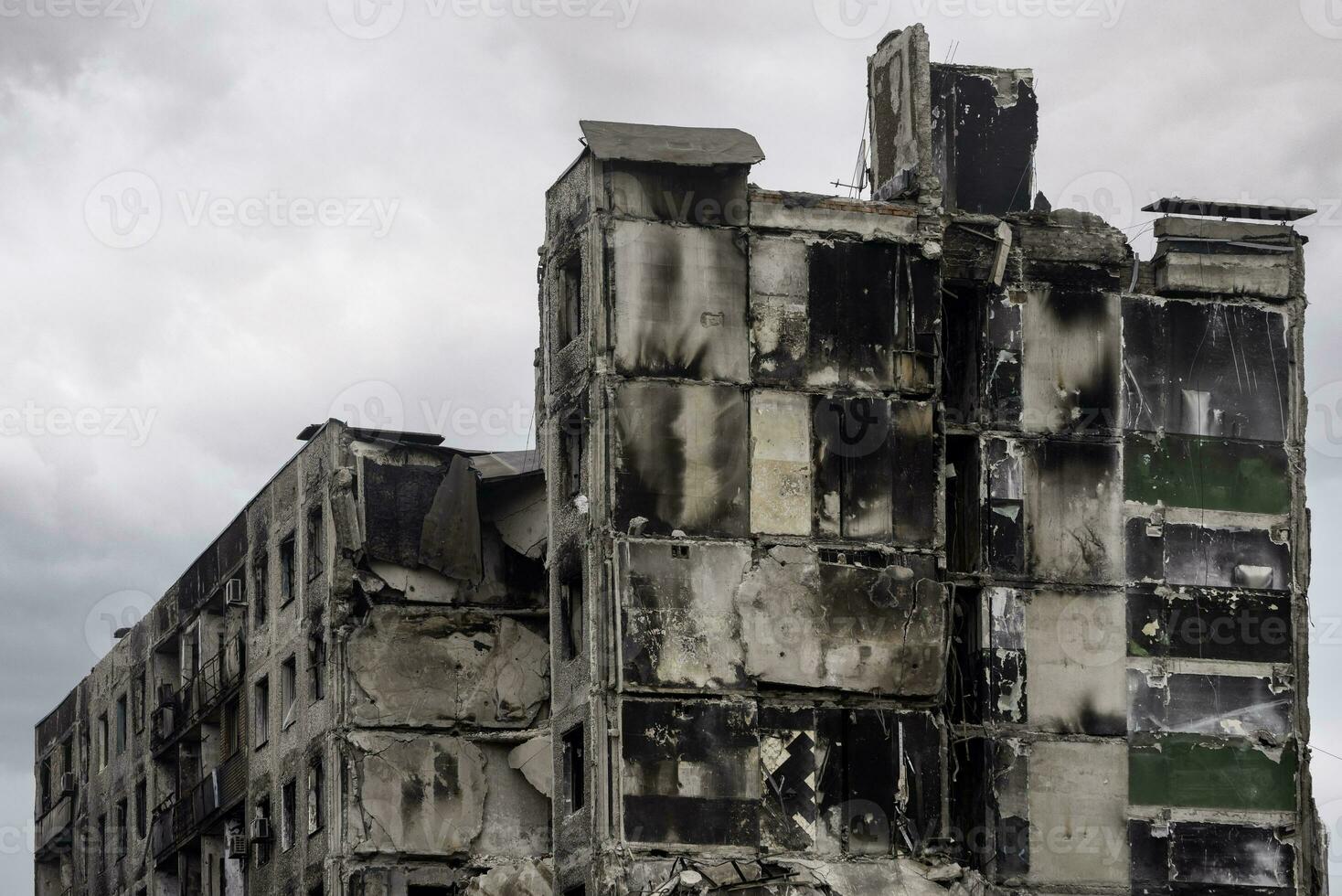 destroyed and burned houses in the city Russia Ukraine war photo