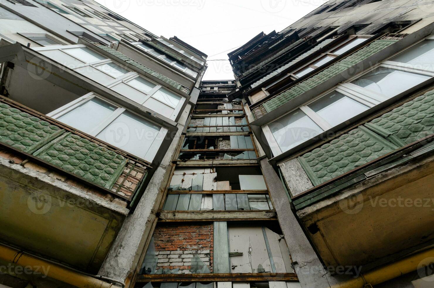 destroyed and burned houses in the city Russia Ukraine war photo