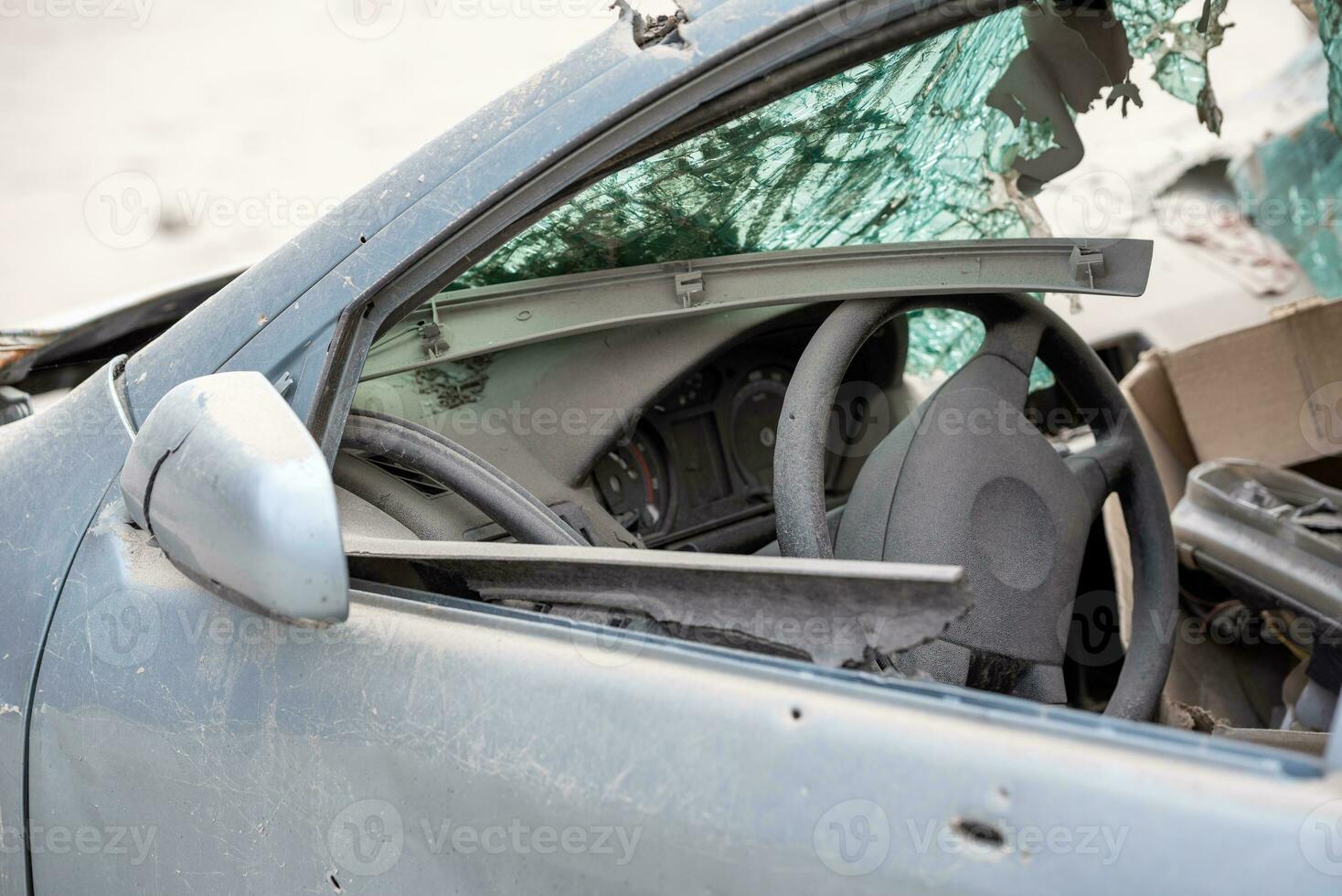 damaged and looted cars in a city in Ukraine during the war photo