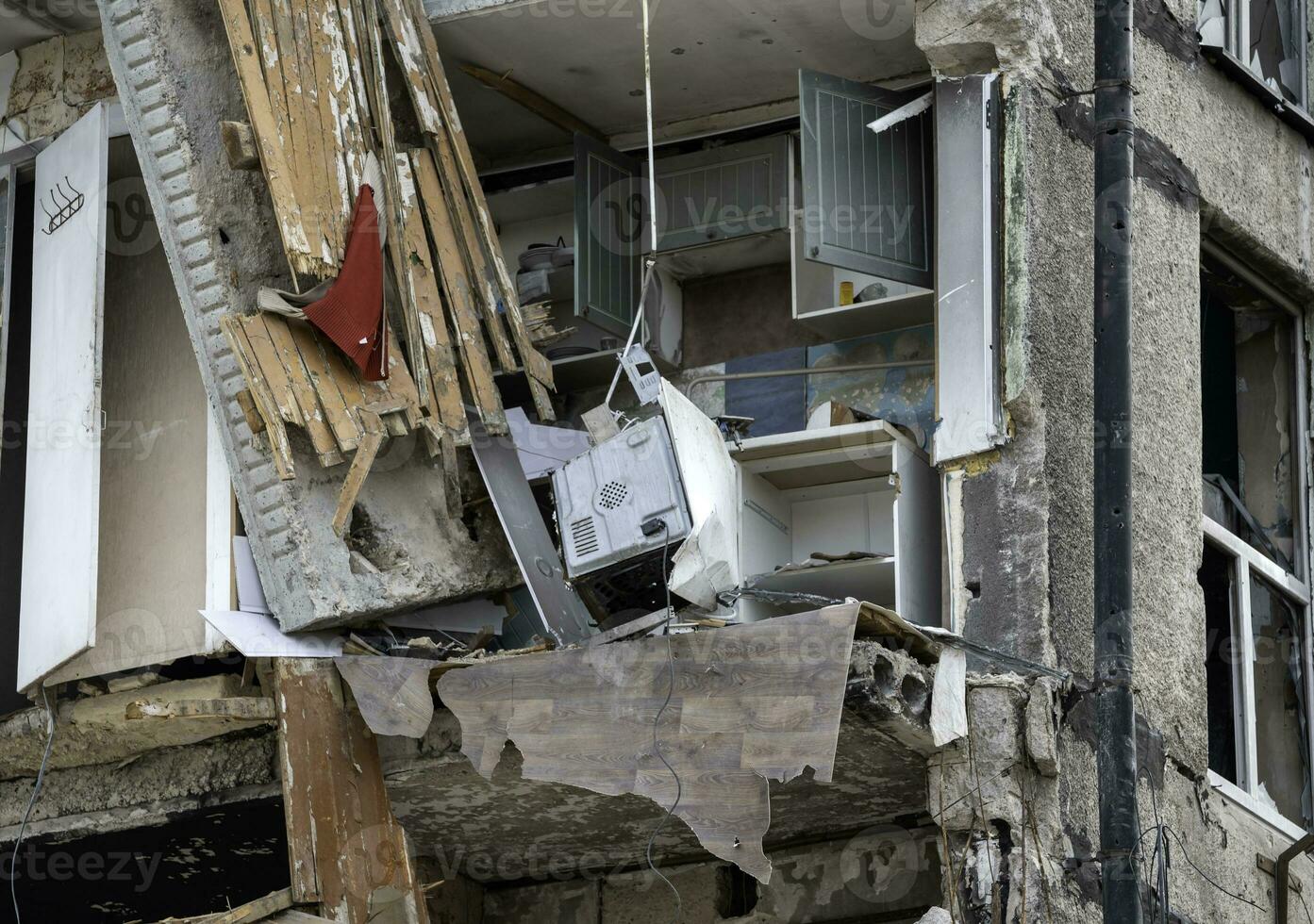 destroyed and burned houses in the city Russia Ukraine war photo