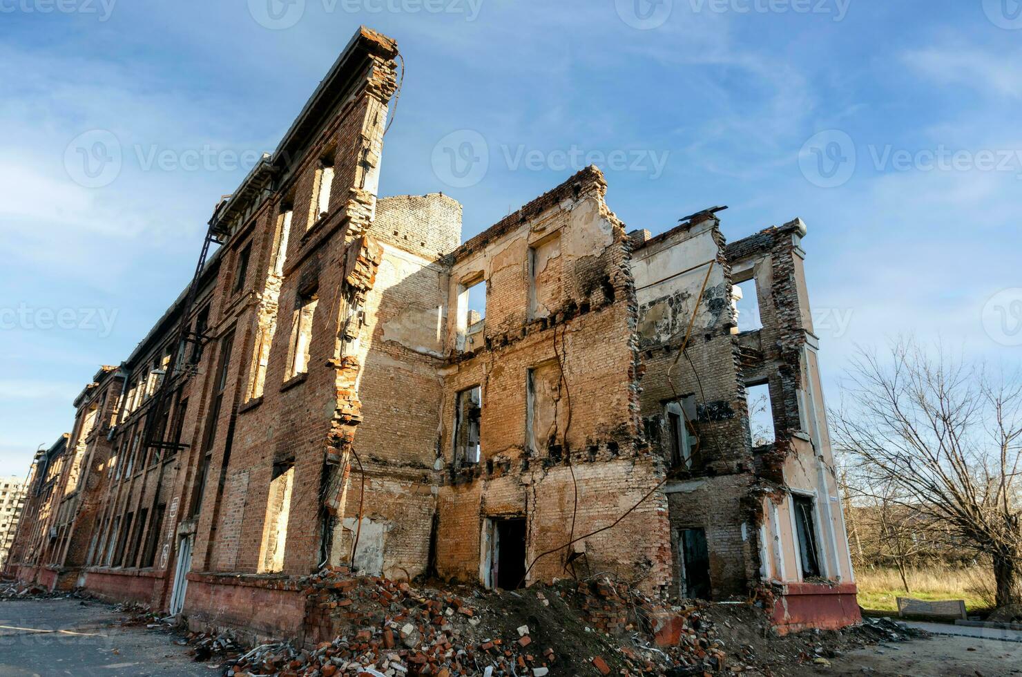 destroyed and burned houses in the city Russia Ukraine war photo