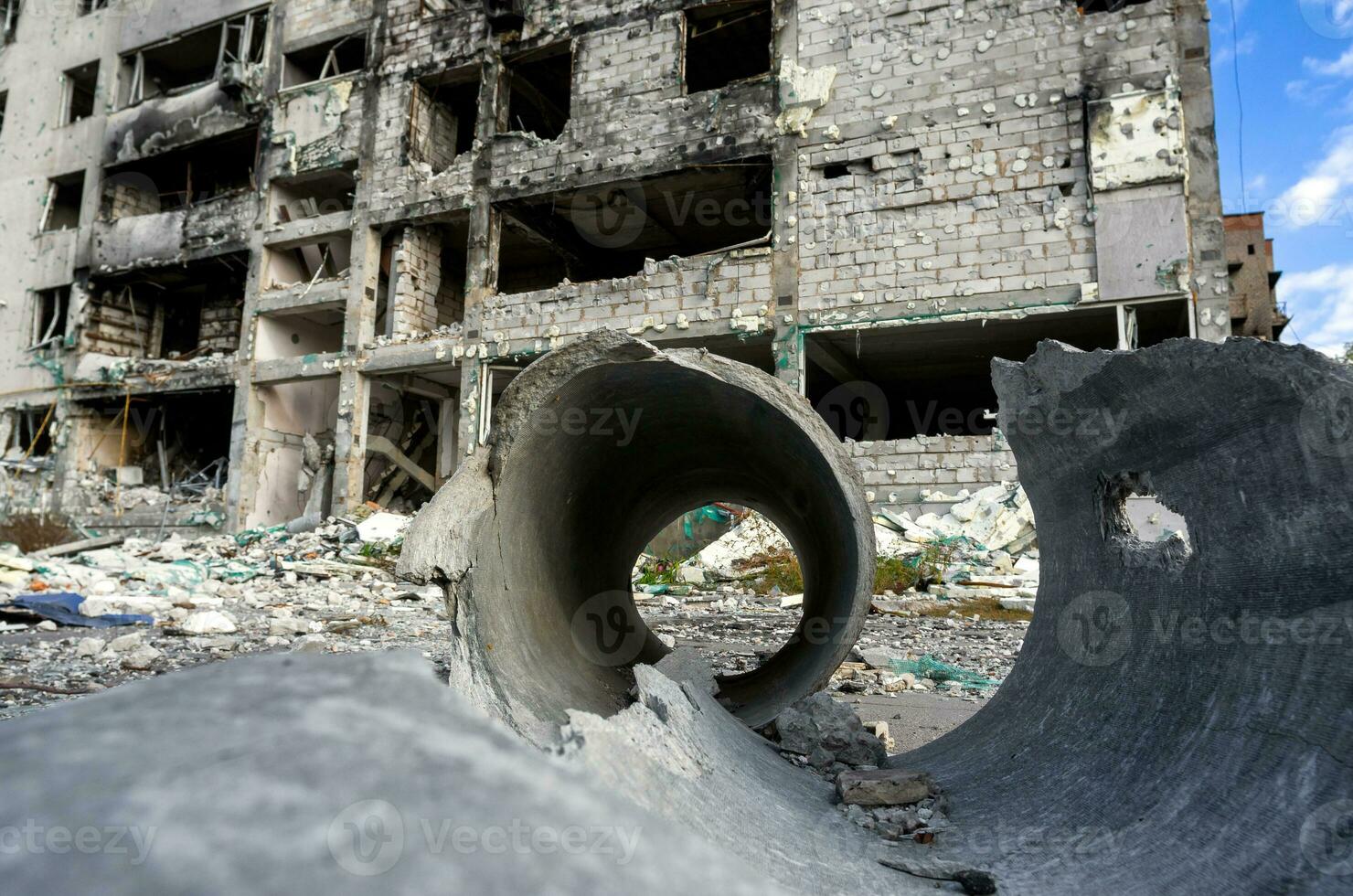 destroyed and burned houses in the city during the war in Ukraine photo