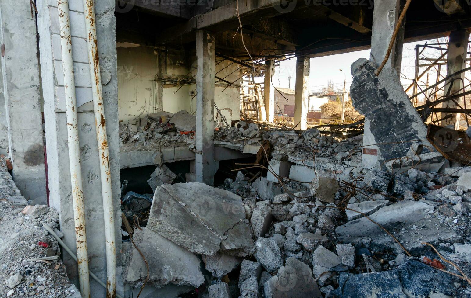 destroyed and burned houses in the city Russia Ukraine war photo
