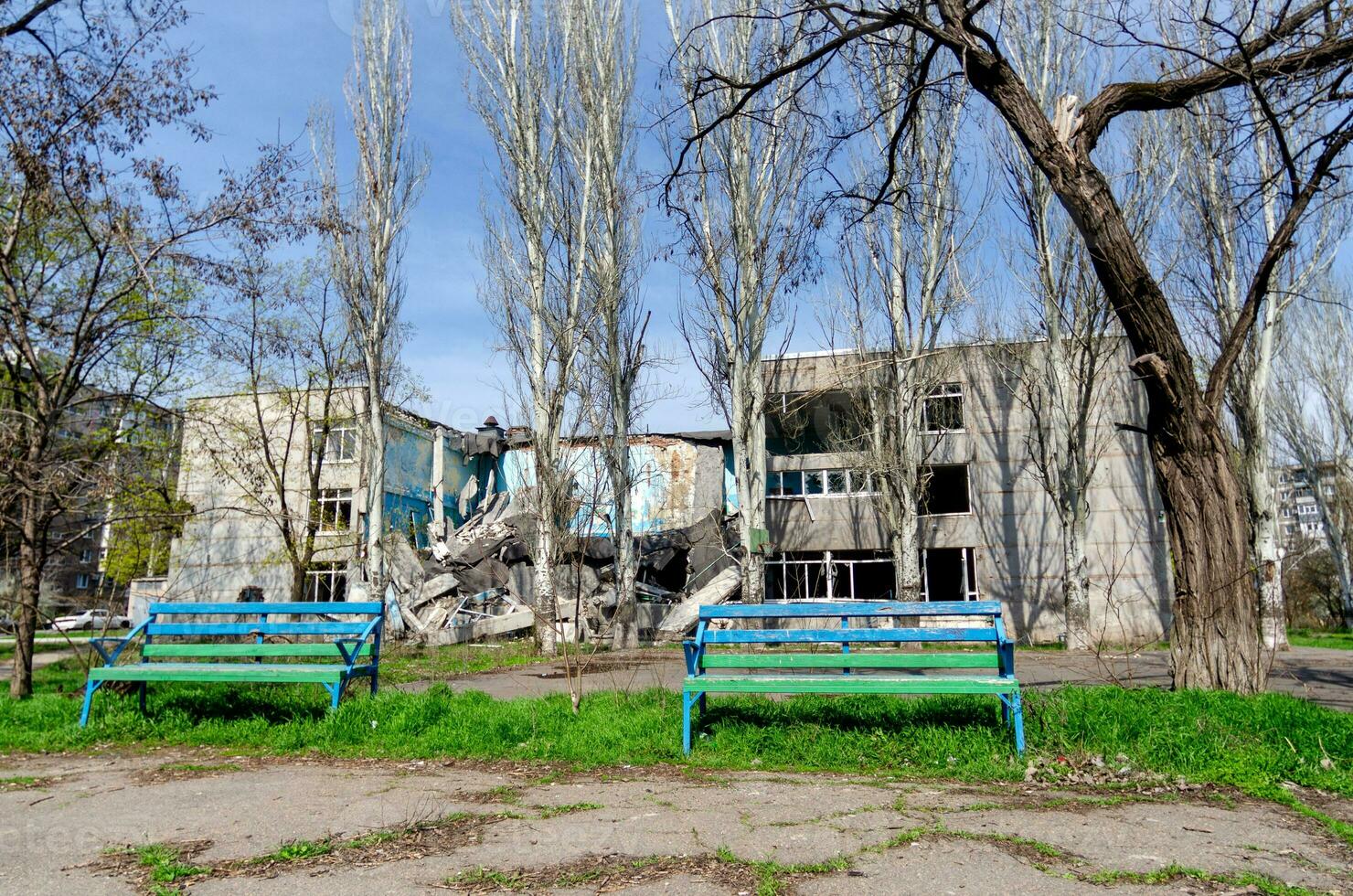 destroyed and burned school in the city Russia Ukraine war photo