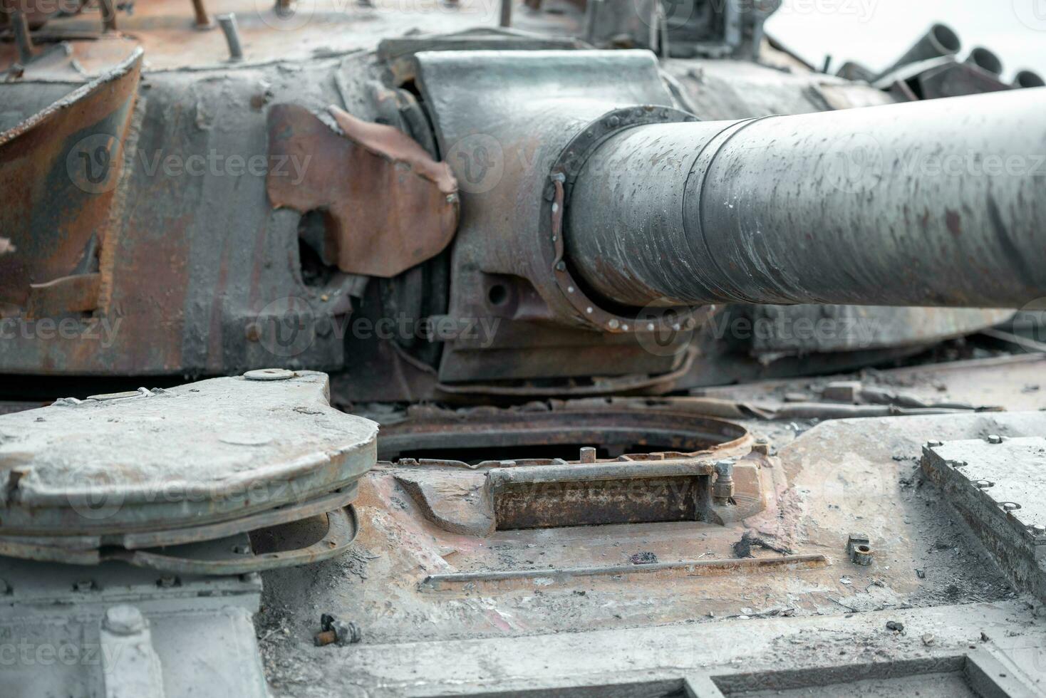 damaged military tank on a city street in Ukraine photo