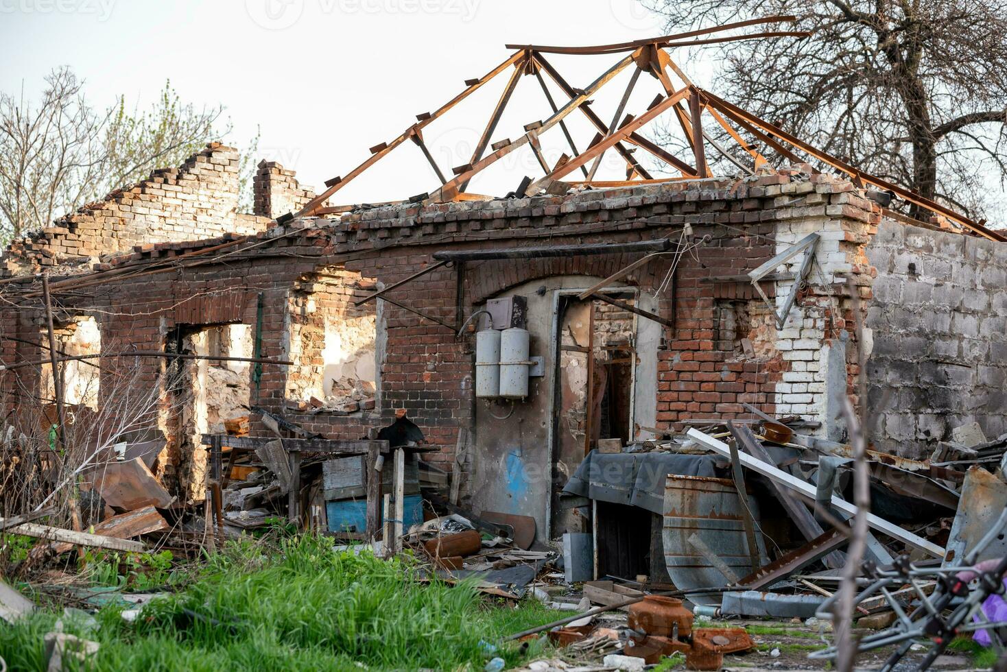 destroyed and burned houses in the city Russia Ukraine war photo
