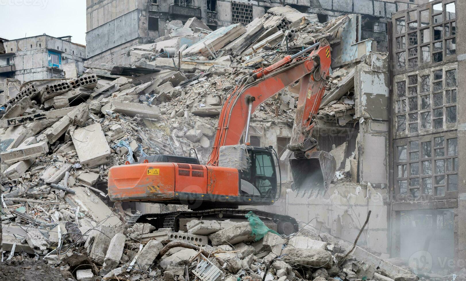 construction equipment destroys affected houses war in Ukraine photo