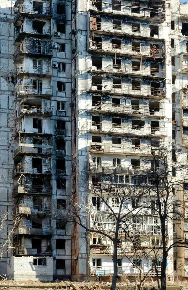 destroyed and burned houses in the city Russia Ukraine war photo