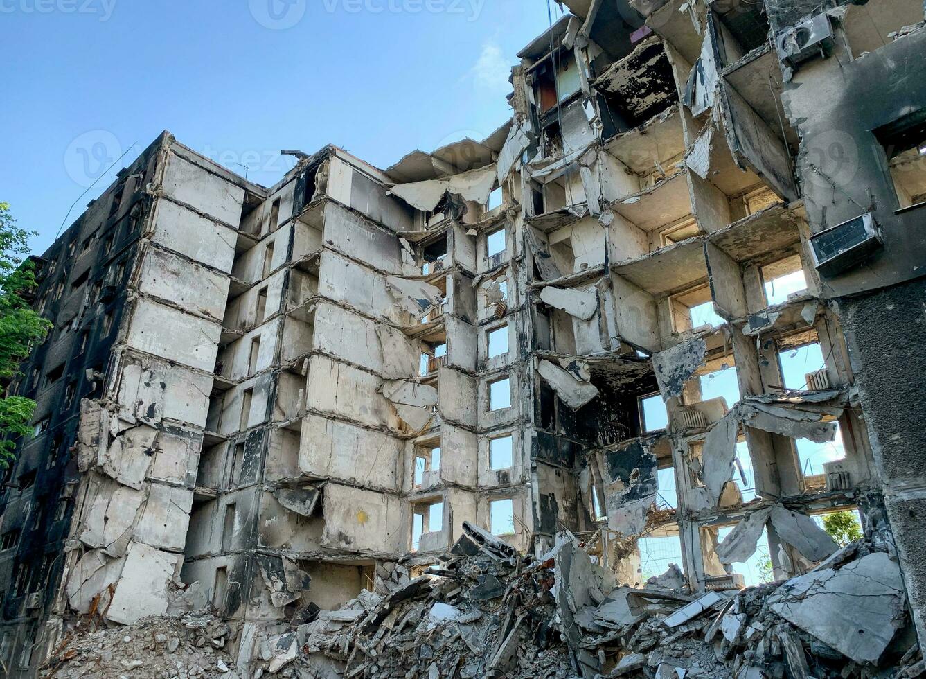 destroyed and burned houses in the city Russia Ukraine war photo