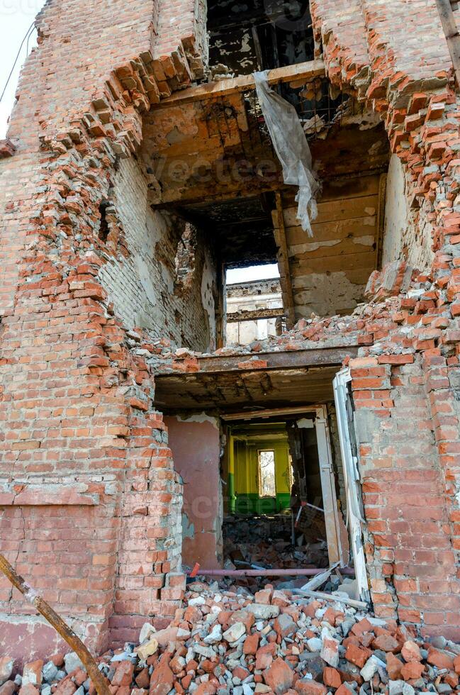 destroyed and burned houses in the city Russia Ukraine war photo